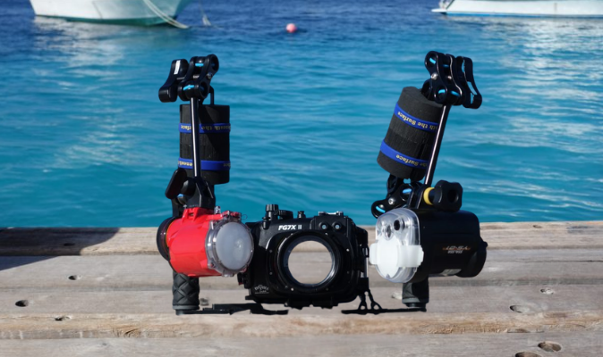 Dual underwater strobes positioned above and close to the housing for macro photography